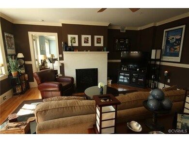 Great room has a working fireplace.
