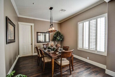 Dining room with hand scraped hardwood
