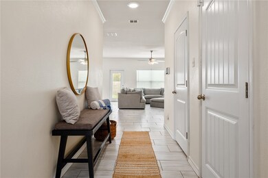Garage and Laundry room off the entry hall