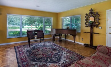 Formal living room.  Large windows with views of t