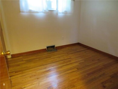 3rd bedroom with gleaming floor