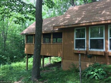 Cozy home tucked into the woods