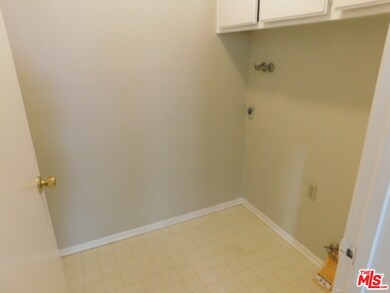 Laundry room inside unit