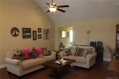 Living Room with vaulted ceiling and fireplace