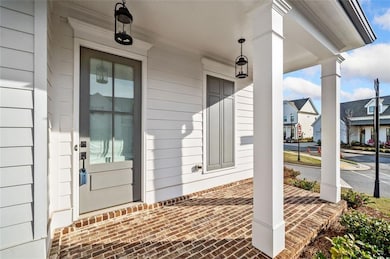 Covered front porch.  Come watch the sunset!