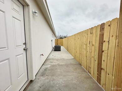 View of property exterior with central AC unit