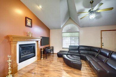 Vaulted Ceilings, Gas fireplace, beautiful floorin