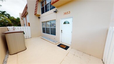 Front Entrance with Privacy Wall and Storage