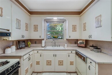 Large kitchen with breakfast bar has a great layou