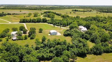 Both Homes w/ Barn in the Center