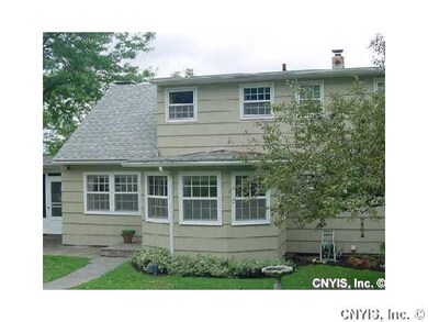 Exterior Back Generous driveway parking and lake l