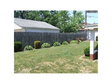 Beautiful rear yard fenced on 3 sides.