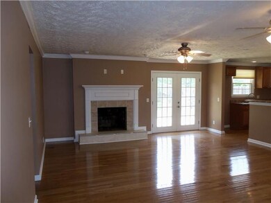 Living room area and fireplace.