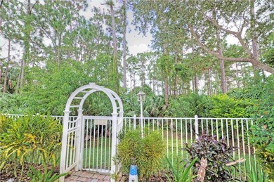 Great Room overlooking lushly landscaped rear yard