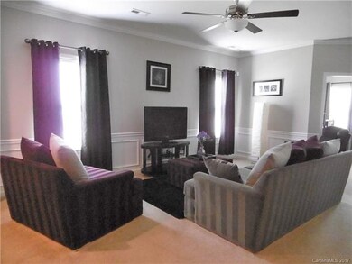Living room, office door on right