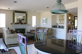 View of the family room from the dinette area adjacent to the kitchen.