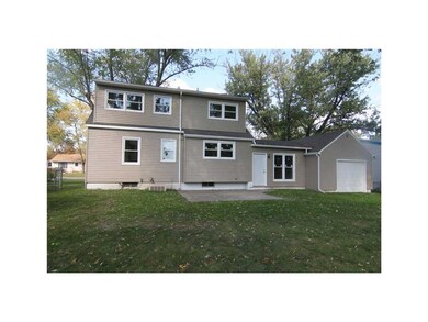 Exterior Back. Large Patio, Back of Attached Garag