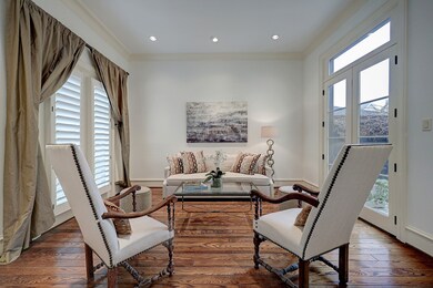To the left of the entry is the formal living room