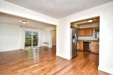 Kitchen with appliances with stainless steel finis