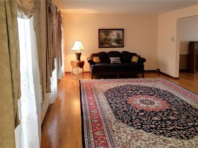 LARGE LIVING ROOM WITH LOTS OF NATURAL LIGHT AND H