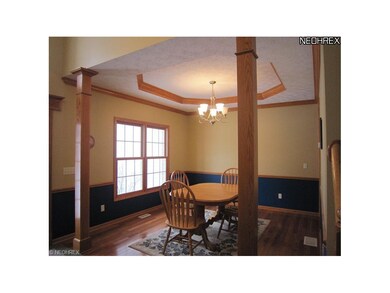 Formal Dining Room w/Hardwood Floor & Crown Moldin