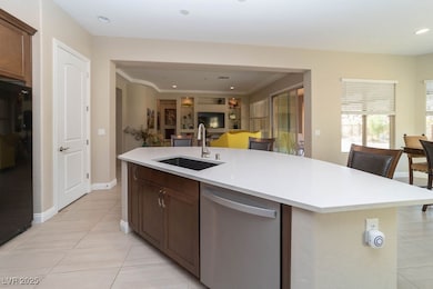 Kitchen featuring light tile patterned flooring, a