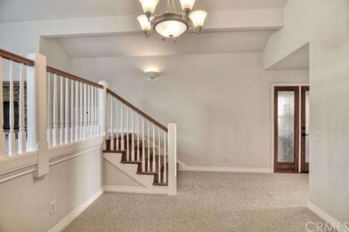 Upstairs unit entrance and dining room.
