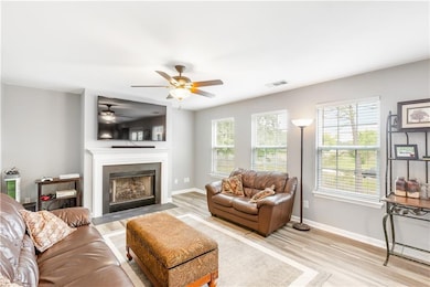 Living room featuring light wood finished floors, 