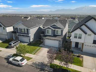 Aerial view of residential area featuring mountains