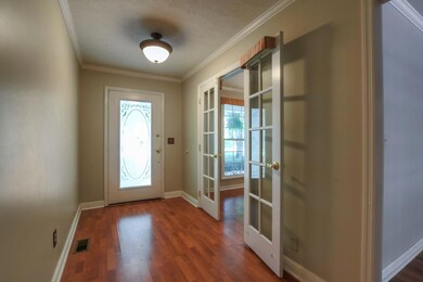 Off the foyer, the dining room has french doors!