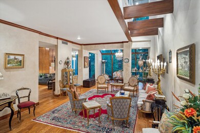 Flooded with natural light, the formal living room