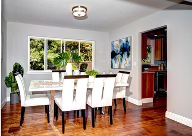 Formal dining room has a large window viewing the 