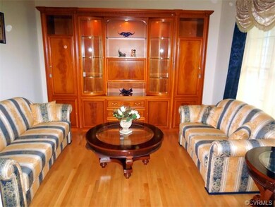 Open to Foyer. Versatile living space used here as