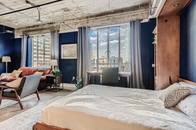 Bedroom featuring a view of city