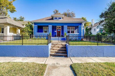 Bungalow-style house with covered porch and a fron