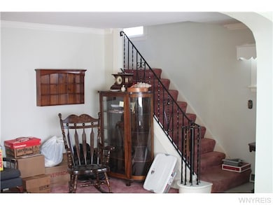 Living Room. Tiled floor entrance way and carpeted