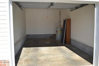 Beep Beep, in comes the car. Imagine pulling into this 1.5 car deep garage with entrance into the home. 