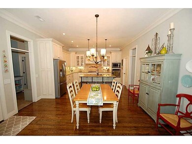 Kitchen. Living area flows easily into eat-in kichen and kitchen area.  Such a great space for entertaining!