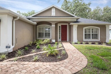 Stroll down the PAVER walk and take one step inside and the care for this home is evident.