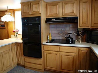 Kitchen. Double ovens and a gleaming cooktop along