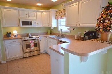 Kitchen with stainless steel appliances.