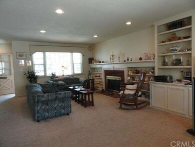 Living room w/recessed lighting & new windows