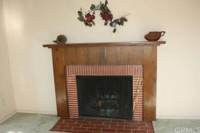 Wood burning fireplace in living room