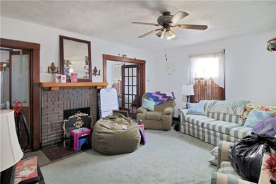 Living room with decorative fireplace
