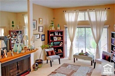 Second view of Living Room with patio view
