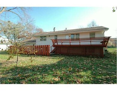 Exterior Back. Repainted deck, exterior freshly pa