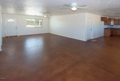 3  24230 E Cholla Rd