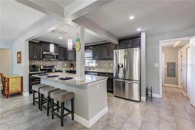 The kitchen is open and bright!