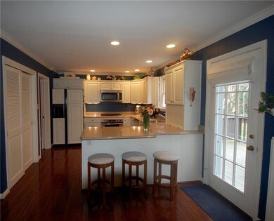 Another view of the kitchen from the adjoining fam