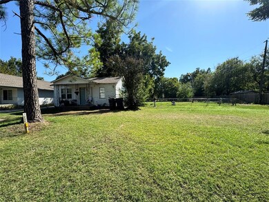 View of yard featuring covered porch